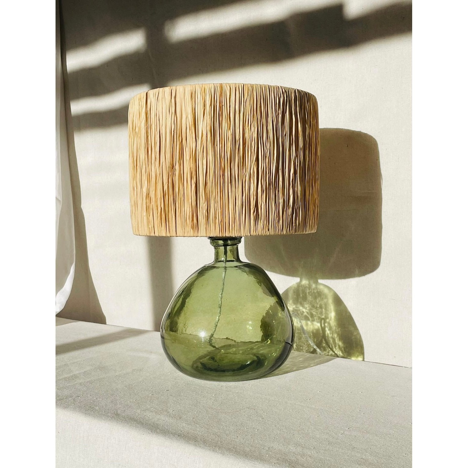 Alma Bay Glass Table Lamp with Hand wrapped Raffia Shade